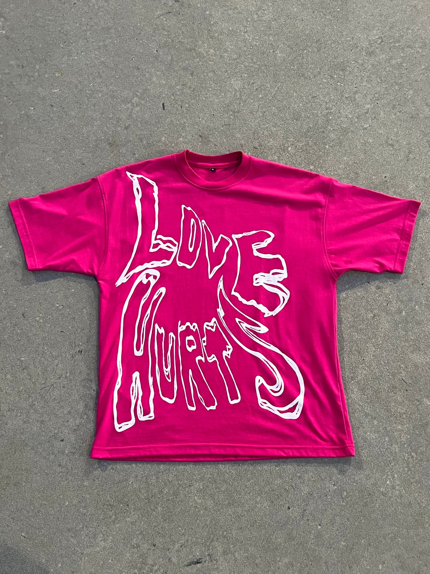 LOVE HURTS TEE