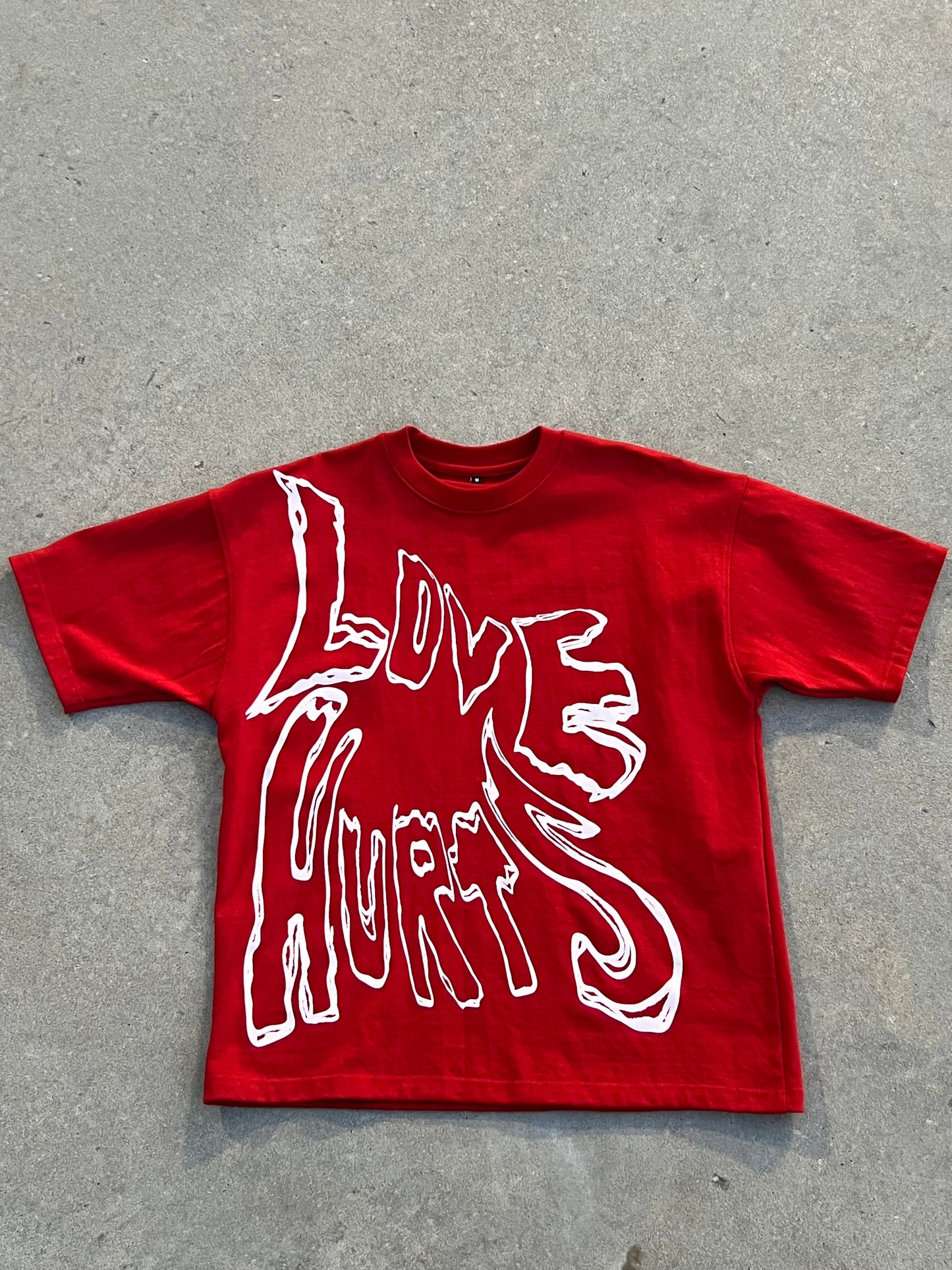 LOVE HURTS TEE